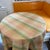 A beautiful silk taffeta plaid round table cloth made out of the most exquisite fabric and is well made. The colors are...