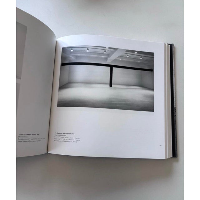 This substantial hardcover volume was published by the Museum of Modern Art (MoMA) in 2007 to accompany Serra's landmark...