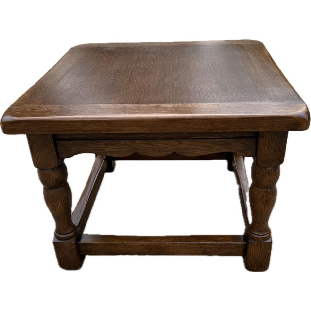 Lovely solid wood end table with scalloped apron, turned legs and bottom stretchers. Very substantial