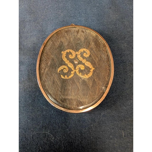 This vintage miniature portrait of a nineteenth century handsome british gentleman is meticulously rendered. Featured...