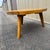 Solid wood Koa wood table, hardwood. Cross cut shows organic grain variation.