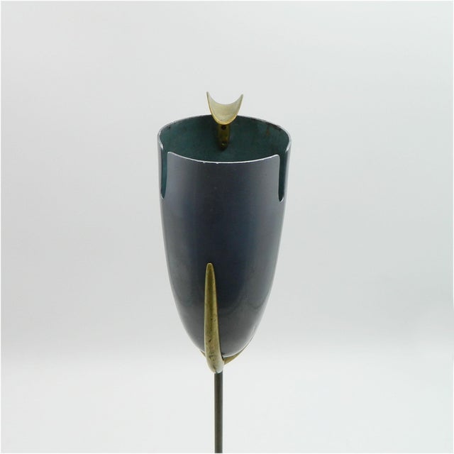 Magnificent standing ashtray, model 9074, from the Hagenauer workshop in Vienna. This ashtray has a black lacquered cast...