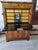 Masterful craftsmanship in a beautiful walnut-grain veneered headboard, below which is a large drawer; a very beautiful...