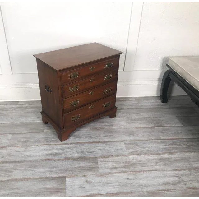 A smaller version of an American and English classic bachelors chest. Done is solid cherry by Pennsylvania House Furniture...