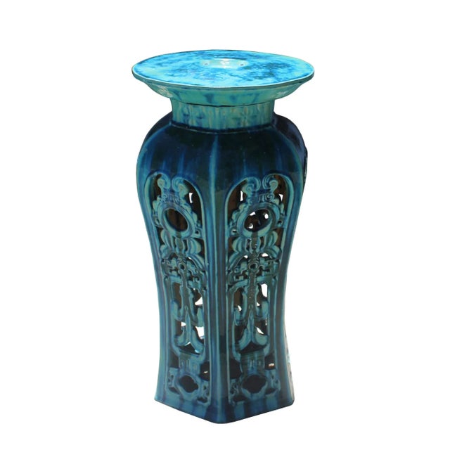 This stand / table is made of clay and glazed with turquoise green-blue color. It is a decorative piece for indoor or...