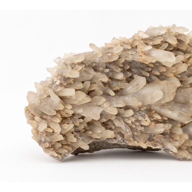 Clear Quartz Crystal Cluster Mineral Specimen. 7.5" H x 22" W x 12" D. Provenance: From an East 53rd Street Collection....