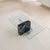 Bring timeless design into your home with this Postmodern coffee table in black marble and glass. Design Highlights: A...