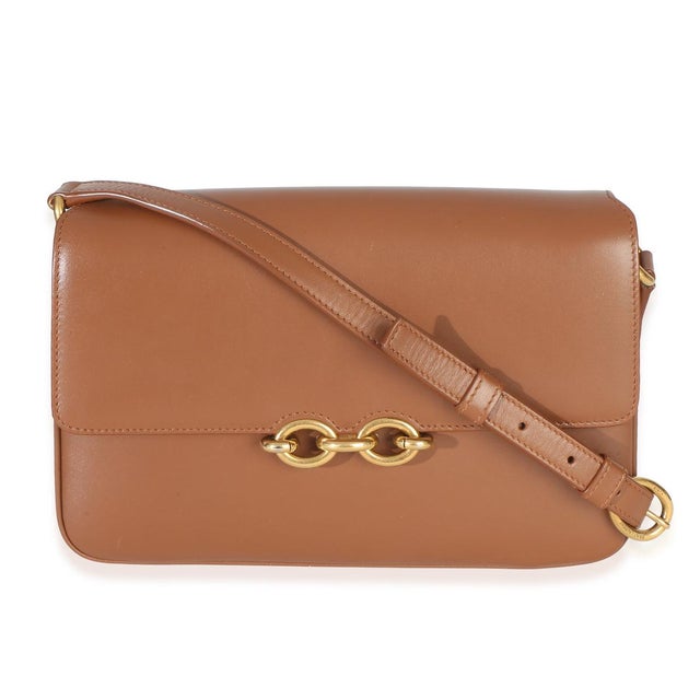 Item #: 154432 Interior Material: Fabric;Leather MSRP: 2,490 Features Interior: Two gussets. Two slip pickets. One zip...