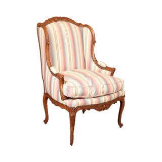 French Louis XV Carved Walnut Bergere Chair For Sale