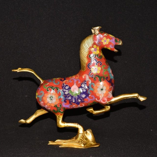 This is a finely crafted antique cloisonné enamel sculpture of a galloping horse, a traditional symbol of power,...