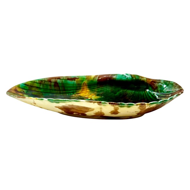 A beautiful English Wedgwood majolica serving dish, naturalistically modeled in the form of a large scallop shell and...