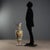 Large polychrome majolica amphora with an oval body on a high foot. Ribbon handle and everted spout. Decorated with...