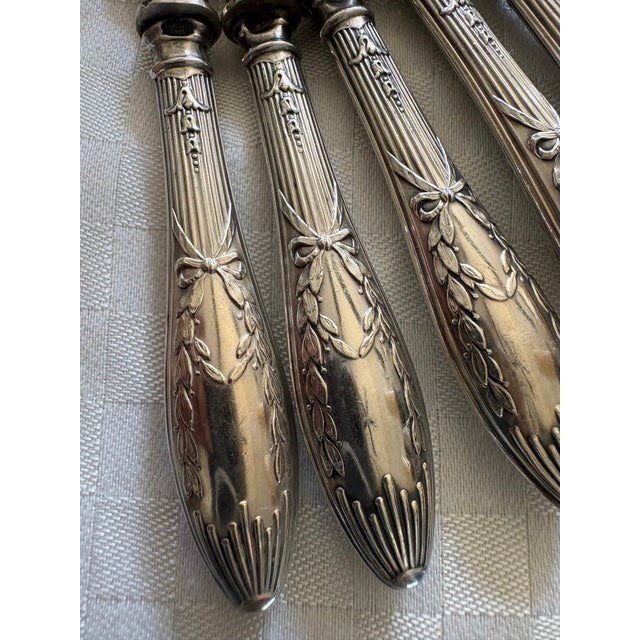 6 antique sterling silver handled fruit, cheese or dessert knives. These knives have ornate handles with vertical fluting...