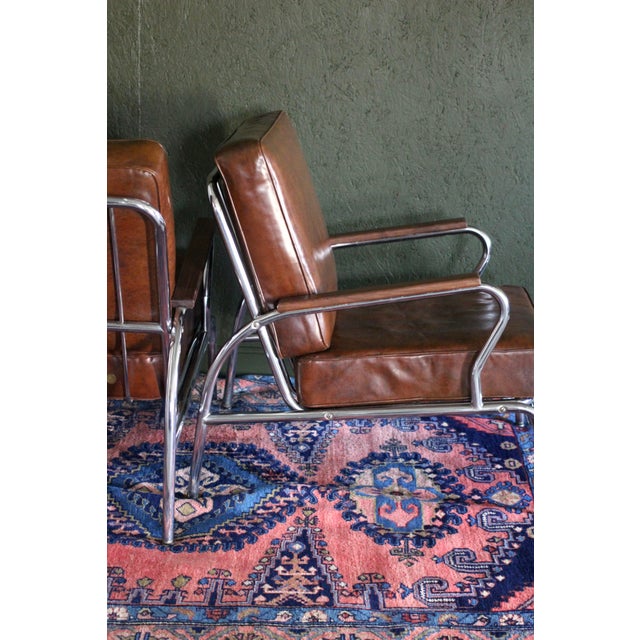 Art Deco style pair of Chromecraft chairs made in St. Louis, MO. Late Art Deco or Midcentury armchairs in chrome, dark...