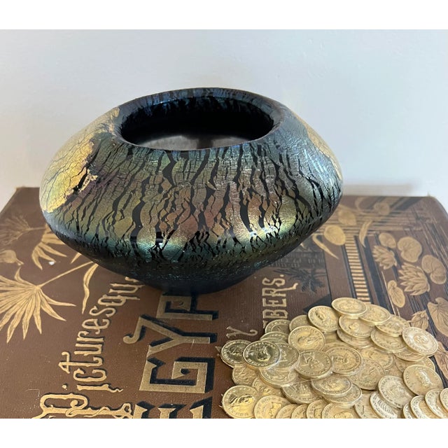 The colors, the iridescent blue aurene, purples, and the 22 kt. gold fuming made this art glass a must have. Artist:...