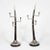 A pair of large oryx horn three-arm candelabra, with silvered adjustable arms, tips and bases, all on ebonized turned wood...
