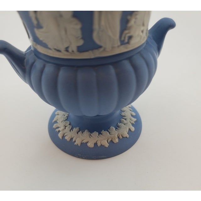 Add timeless elegance to your collection with this **Vintage MCM Wedgwood Jasperware Urn Vase**. Featuring the classic...