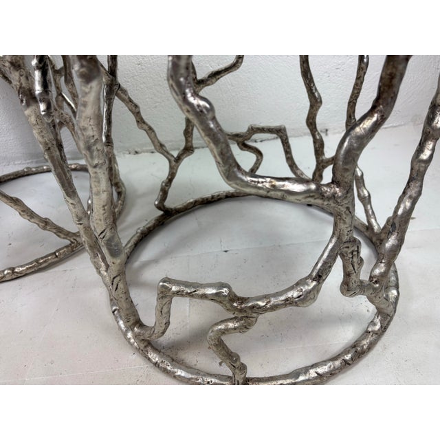 This is a pair of modern nickel plated faux bois metal benches. These exceptional benches have modern nickel plated metal...