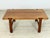 Stylish mid-century coffee table by Danish designer Niels Bach. This piece of furniture is distinguished by its high-...