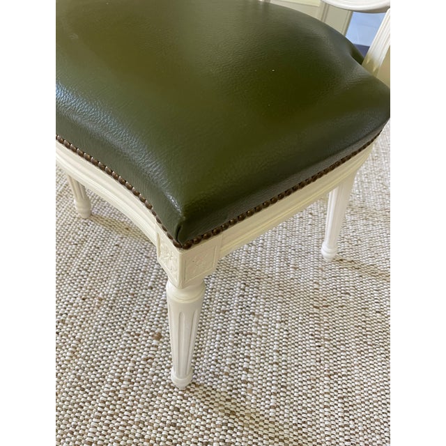 Set of 4 beautiful antique Louis XI style oval back dining chairs. They have been recently repainted in a creamy white and...