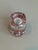 This vintage Art Deco red, white, and black checkered shot glass is a unique and stylish addition to any barware...