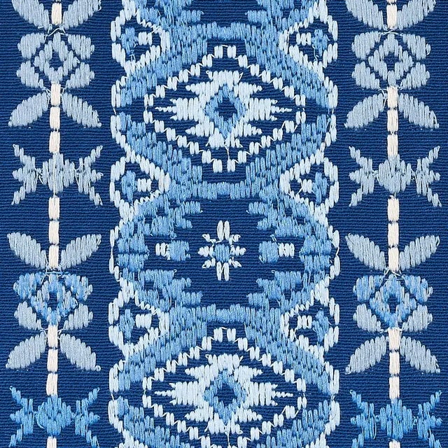 Motifs that are woven and then embroidered give this elaborate, multicolored vertical stripe the look of an authentic...