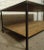 Contemporary coffee table featuring solid iron frame and two levels with beautiful walnut grain throughout. Please confirm...