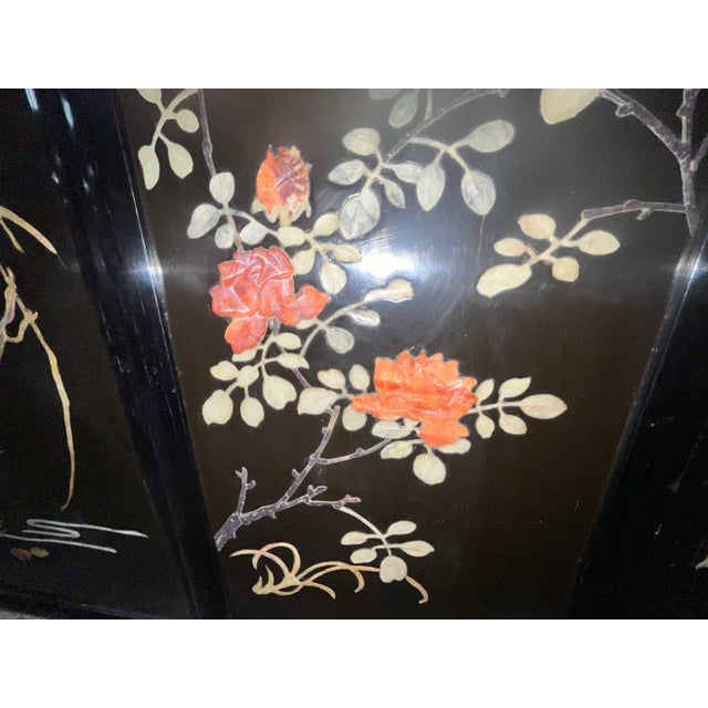 A beautifully aged set of vintage Asian wall panels made of lacquered wood and inlayed with carved hard stone birds and...