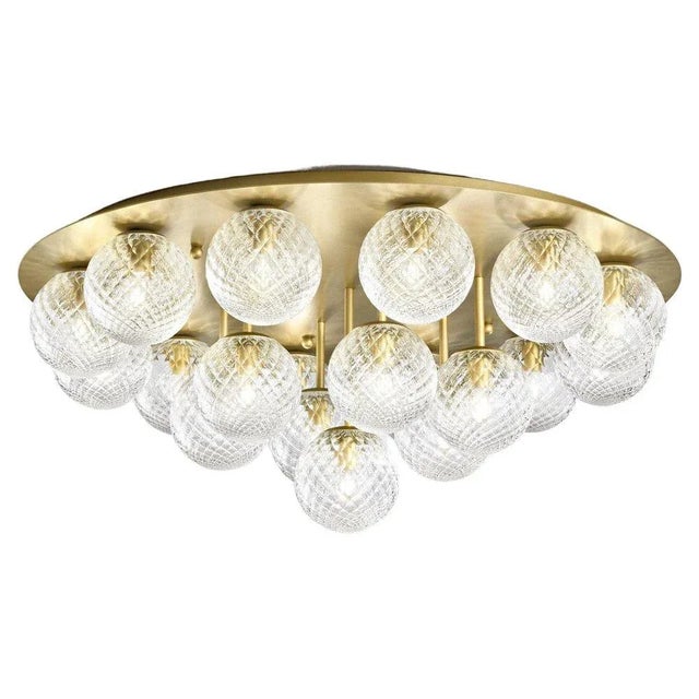 Italian modern flush mount with clear or smoky textured Murano glass globes, mounted on round ceiling plate in satin gold...