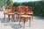 Exceptional set of eight bistro-style chairs in the Thonet style. Stamped "Fiume" or hot-stamped "Chevalier". This model...