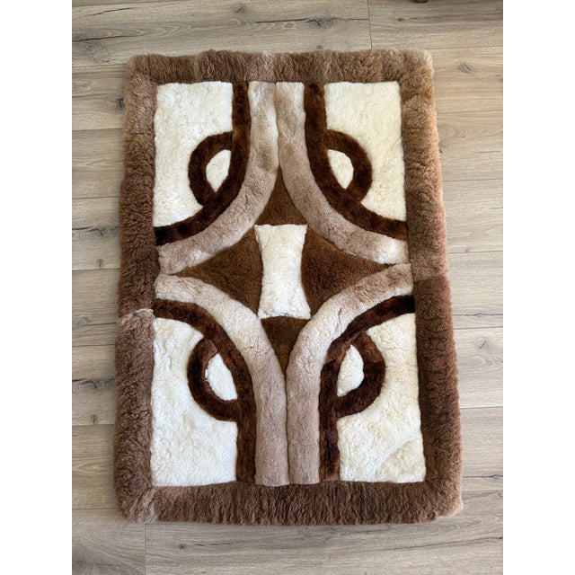 Purchased in Lake Tahoe long ago, this Alpaca fur rug/throw is as soft and beautiful as the day it was purchased. Backed...