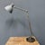 Large Kandem workshop table lamp model 566 with light gray enamel shade. This workshop lamp was produced between 1935-1937...