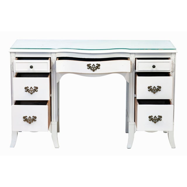 Lovely early mid‑century traditional mahogany desk or vanity newly lacquered a soft ivory tone. The piece features classic...