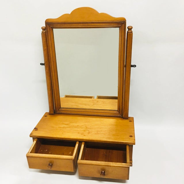 Vintage Maple Tabletop Vanity Mirror with two Drawers. The adjustable mirror swivels in place above two dovetailed drawers.
