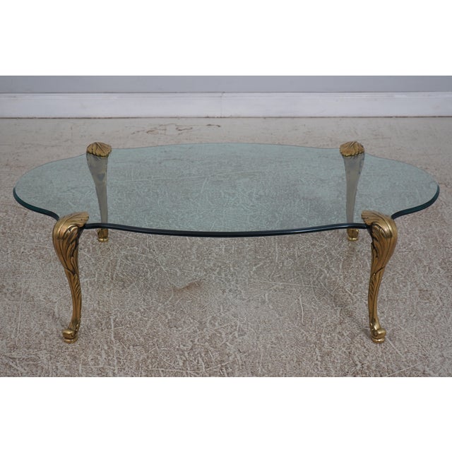 Age: Approx: 30 Years Old Details: Heavy Solid Brass Legs Beveled Glass High Quality Construction Hollywood Regency Style...