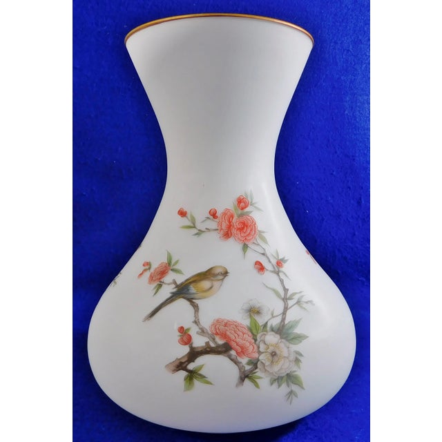 Beautiful Vintage Mid Century White Satin Glass Bulbous Vase decorated with birds and pink flowers. Finished with a gold...