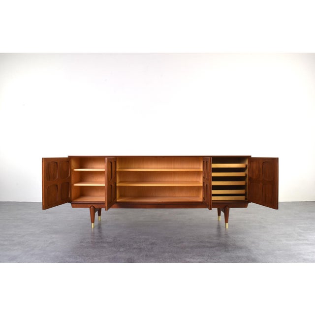 This teak sideboard model Frithjof was designed in the 1960s by a pair of Norwegian designers Rolf Rastad and Adolf...