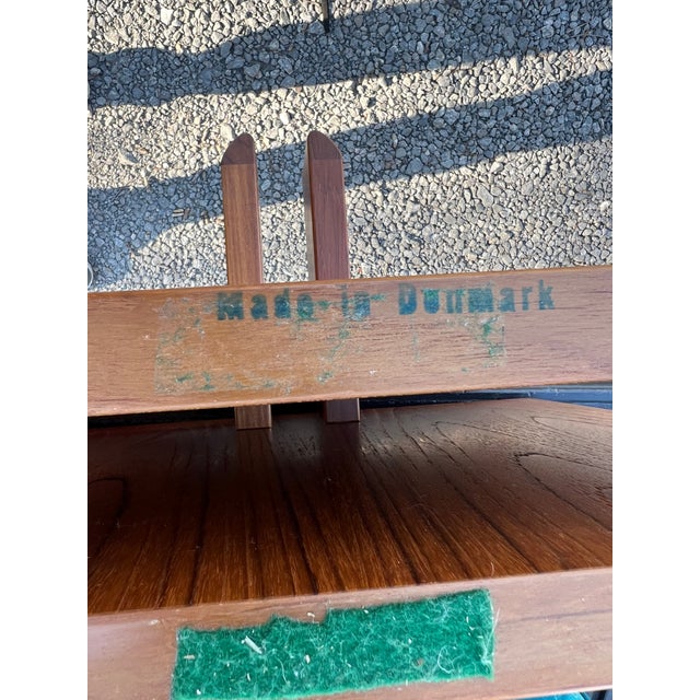 Danish Mid-Century Modern Teak Table with a Beveled Glass . Marked made in Denmark on Bottom of Pedestal. Gustav Gaarde...