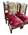This set of carved wood chairs manage to be both rustic and refined. Done in Baroque style with nail head-trimmed velvet...