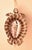 An exquisite handwoven turtle figurine, featuring a stunning tiger leopard cowrie shell at its center. This beautiful...