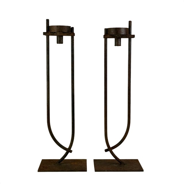 Large Antique Pair of Hand Forged Iron Designer Candlesticks in a Rust Finish For Sale