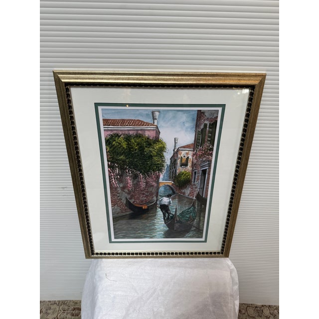 Design Plus Gallery presents a Framed and Signed Art Piece of the Canal in Venice, Italy. A sunny day in Venice captured...