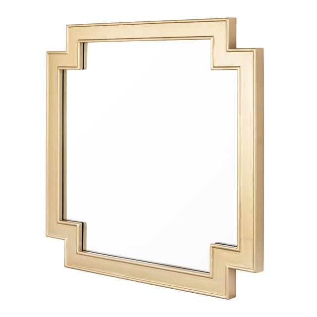 The Ephyra Mirror brings modern sophistication to any space. Its geometric frame, crafted from gold-plated wood, catches...