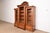 A gorgeous antique Eastlake Victorian or Renaissance Revival triple bookcase cabinet or display cabinet In the manner of...