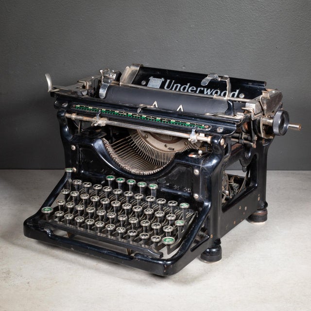 ABOUT An original Underwood typewriter No.6 with a 16 inch carriage and an open-frame design. The typewriter works well...