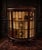 An elegant early 20th-century mahogany display cabinet of particularly attractive proportions, featuring a bowed glazed...