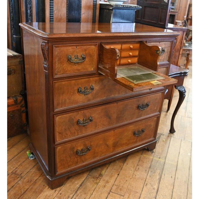 Gorgeous walnut secretaire with pull out writing slope with tooled leather top Also lots of small drawers around the...