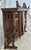 A striking piece of late‑Victorian American craftsmanship, this 1890s tiger oak overmantel brings warmth, character, and...