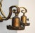 A nice pair of light fixtures with each having: five switched down lights, decorative floral and other painted elements,...