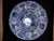 Slightly lobed dish in eight braces with flared rim with underglaze blue decoration of birds in a garden. A few chips on...
